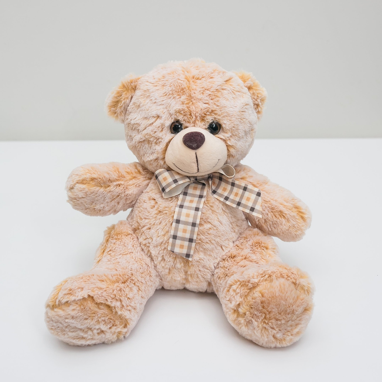 Малый мишка коричневого цвета